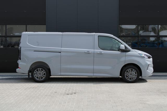 Ford TRANSIT CUSTOM 320 2.0 TDCI L2H1 Limited 150pk - 2x Schuifdeur - Adaptive Cruise - Verwarmd stuur - Blind spot - Navigatie - Camera - Draadloos laden - Rijklaar