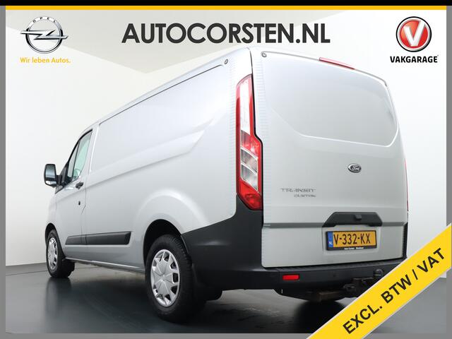 Ford TRANSIT CUSTOM Automaat 290 2.0TDCI 131PK L1H1 Navi Airco Cruise Camera Trekhaak Pdc Regen-/lichtsensor Euro 6 Trend Bluetooth Voorruit verwarmbaar Achterklep Zijschuifdeur Wandbetimmering Adaptieve bochtverl 1e Eigenaar Euro 6