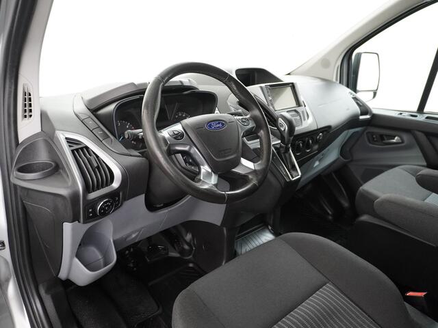 Ford TRANSIT CUSTOM Automaat 290 2.0TDCI 131PK L1H1 Navi Airco Cruise Camera Trekhaak Pdc Regen-/lichtsensor Euro 6 Trend Bluetooth Voorruit verwarmbaar Achterklep Zijschuifdeur Wandbetimmering Adaptieve bochtverl 1e Eigenaar Euro 6