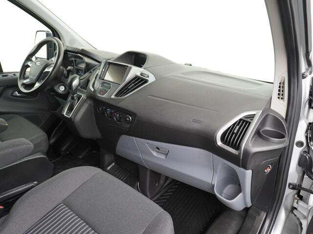 Ford TRANSIT CUSTOM Automaat 290 2.0TDCI 131PK L1H1 Navi Airco Cruise Camera Trekhaak Pdc Regen-/lichtsensor Euro 6 Trend Bluetooth Voorruit verwarmbaar Achterklep Zijschuifdeur Wandbetimmering Adaptieve bochtverl 1e Eigenaar Euro 6