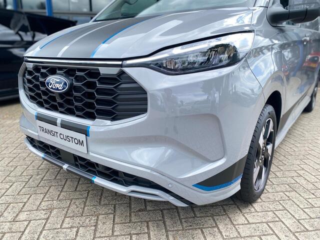 Ford TRANSIT CUSTOM Sport 2.5 233pk e-CVT PHEV 8-weg verstelbare verwarmbare passagiersstoel | Inklapbare trekhaak | Centrale dubbele vergrendeling | 19 inch lichtmetalen Sport velgen | Driver Assistance Pack Premium | Verwarmbaar stuurwiel | AGM accu | PHEV 1-fase oplaadkab