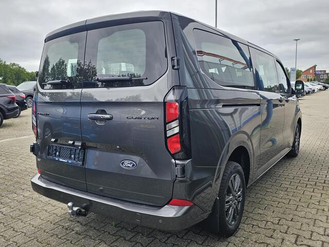 Ford TRANSIT CUSTOM 340 2.5 PHEV L2H1 Limited 233pk | Kombi | Incl. BTW/BPM | Dubbele zijschuifdeur | Privacy Glass | Inklapbare trekhaak | 17 inch lichtmetalen velgen | Driver Assistance Pack Premium | Verwarmbaar stuurwiel