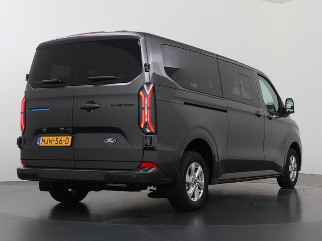 Ford TRANSIT CUSTOM 340 LIMITED | L2 H1 | 65 kWh | ELEKTRISCH | 8-ZITS | ¤53.785,00 INCL. BTW | 2X ZIJSCHUIFDEUR | NAVIGATIE | STOEL/STUURWIELVERWARMING | BLIND SPOT | METALLIC | PARKEERPAKKET | 8 - PEROONS