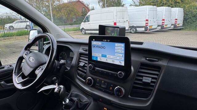 Ford TRANSIT CUSTOM 2.0 TDCI 77KW 105PK L2H1 EURO 6 AIRCO/ NAVIGATIE/ CRUISE CONTROL/ TREKHAAK/ 100% DEALERONDERHOUDEN