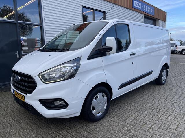 Ford TRANSIT CUSTOM 300 2.0 TDCI 130pk L2H1 Trend / vaste prijs rijklaar ¤ 14.950 ex btw / euro 6 / bpm vrij / lease vanaf ¤ 252 / airco / cruise / navi / camera / trekhaak 2700 kg !