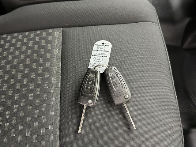 Ford TRANSIT CUSTOM 2.0TDCI Business | Dakdraagsysteem | Trekhaak 2500 Kg | Airco | Cruise | 3-Persoons | Betimmering