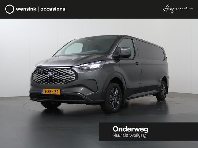 Ford TRANSIT CUSTOM e-Transit 340 | L2 H1 | Limited | 65 kWh | 218 PK | Cruise Control Adaptief | LM Velgen | 2-zits | Navigatie | Parkeercamera | Stoelverwarming | LED Koplampen | Snel-lader | Apple Carplay / Android Auto