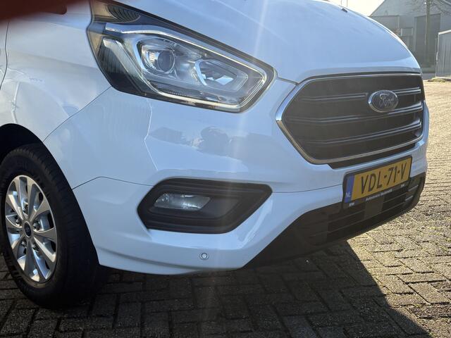 Ford TRANSIT CUSTOM 300 2.0 130Pk TDCI L2H1 Limited / Cruise / Airco / Navi / Trekhaak / Apk t/m 26-11-2025