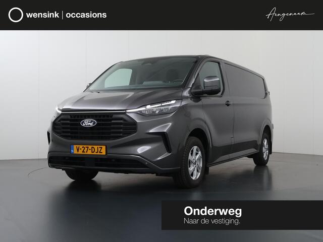 Ford TRANSIT CUSTOM 320 | 2.0 TDCI | L2 H1 | Limited | LM Velgen | 3-zits | Trekhaak | Navigatie | Apple Carplay / Android Auto | Comfort Stoelen | DAB+ | Stoelverwarming | Voorruitverwarming