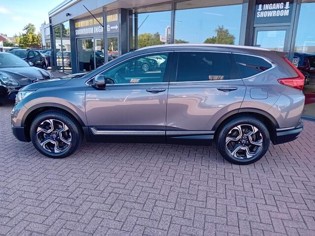 Honda CR-V 2.0 Hybrid Comfort Automaat, Climatronic, Carplay/Android auto, Navigatie, Parkeersensoren, Camera, Dode hoek detector, Cruise control adaptief, Stoelverwarming, etc, etc, Nette auto, BOVAG