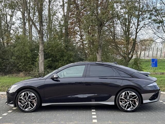 Hyundai IONIQ 6 Lounge 77.4 kWh | Lichte lederen bekleding | Warmtepomp & V2L | Geïntegreerde navigatie | Apple Carplay & Android Auto | Adaptieve Cruisecontrol | Camera | Warmtepomp | Stoel & stuur verwarming | Premium audio BOSE |
