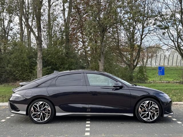 Hyundai IONIQ 6 Lounge 77.4 kWh | Lichte lederen bekleding | Warmtepomp & V2L | Geïntegreerde navigatie | Apple Carplay & Android Auto | Adaptieve Cruisecontrol | Camera | Warmtepomp | Stoel & stuur verwarming | Premium audio BOSE |