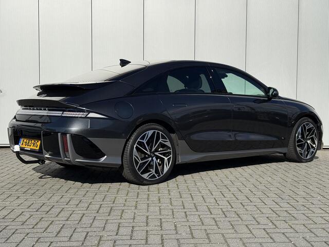Hyundai IONIQ 6 Lounge 77.4 kWh / NL Auto / 10-2029 Fabrieksgarantie / SOH 100 % / Trekhaak afneembaar 1.500 kg / WLTP 545 km / Warmtepomp / Wit Leder / HUD / Camera 360° /