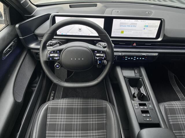 Hyundai IONIQ 6 First Edition AWD 77.4 kWh 325PK | Panorama schuifkanteldak | 800 V snellaadsysteem 10-80% in ca. 18 minuten | 20? lichtmetalen velgen & matzwarte designaccenten | BOSE premium audiosysteem | Premium interieur |