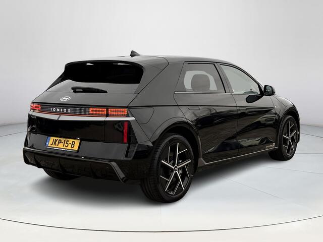 Hyundai IONIQ 5 N Line Business 84 kWh | Achteruitrijcamera | Stoelverwarming | Stuurverwarming | Elektrische stoelen | Verschuifbare 2e zitrij | Elektrische achterklep | Parkeersensoren voor/achter | Draadloze applecarplay en android auto |