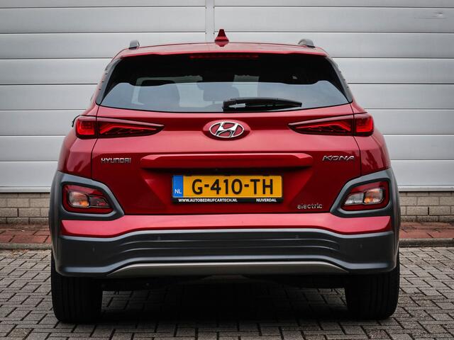 Hyundai Kona EV Premium 64 kWh | Clima | Cruise | Navi | Leer | Stoel/stuur verwarming | Pdc | Camera | Lichtmetaal