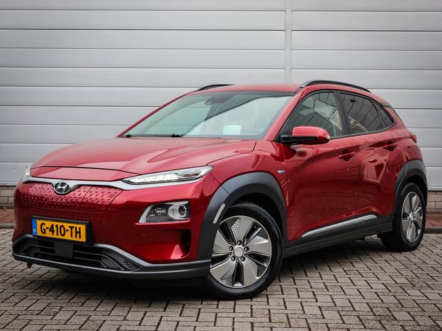 Hyundai Kona EV Premium 64 kWh | Clima | Cruise | Navi | Leer | Stoel/stuur verwarming | Pdc | Camera | Lichtmetaal