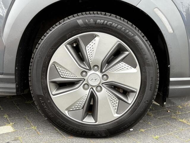 Hyundai Kona EV Premium 64 kWh | Adaptieve cruisecontrol | Head up display | Lederen bekleding | Apple Carplay & Android Auto |