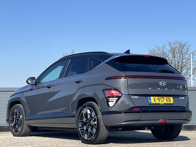 Hyundai Kona Electric Premium 65.4 kWh | Adaptieve cruisecontrol | Contrasterende dakkleur | Warmtepomp & V2L | Lederen bekleding & memory | Allseason banden |