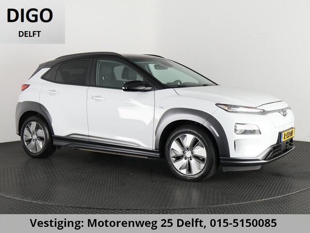 Hyundai Kona PRIMIUM EV 64 KWH 1e EIG ACCU 92% GARANTIE 10-2030 BEREIK 466 KM ! LEDER. STUUR/STOEL VERWARMING.DODE HOEK DETECTIE