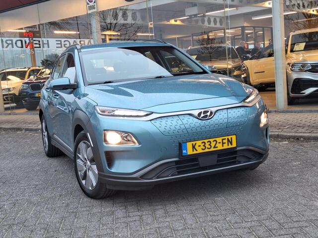 Hyundai Kona EV Comfort 64 kWh | 3 Fase | Warmtepomp | Navi | Adaptive CC | Climate | occasion