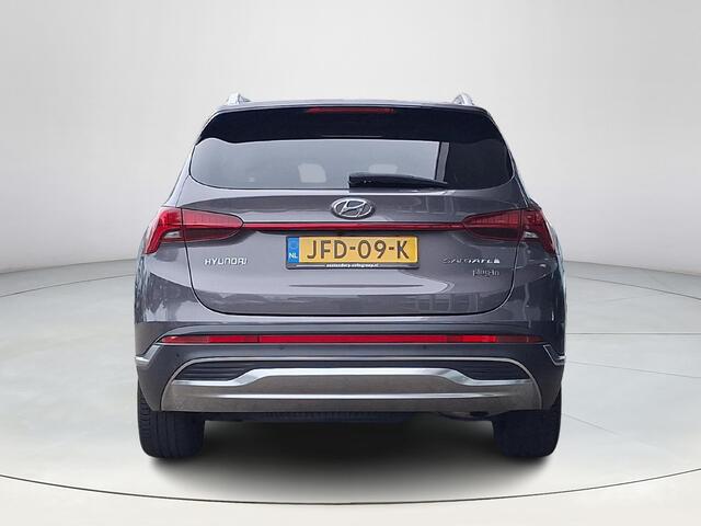 Hyundai SANTA FE 1.6 T-GDI PHEV Premium SKY 7p. | Apple Carplay/Android Auto | Stoel/stuurverwarming | Draadloze telefoon oplader | Elektrische achterklep | Elektrische verstelbare stoelen met geheugen |