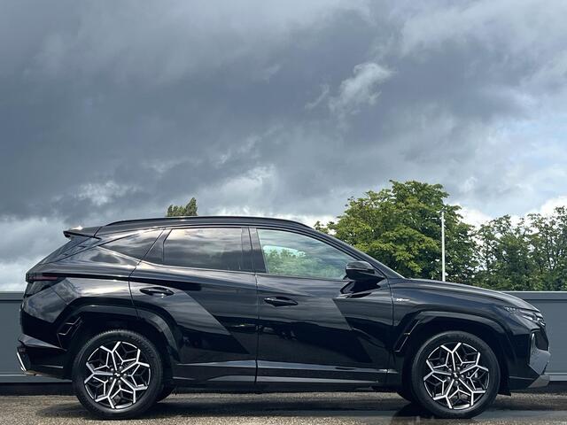 Hyundai TUCSON 1.6 T-GDI HEV 230 PK N Line | 1650 kg trekvermogen | Geïntegreerde navigatiesysteem | Stoelverwarming | Android Auto & Apple Carplay | 19'' Lichtmetalen velgen |