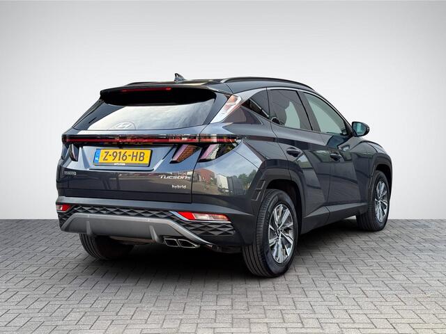 Hyundai TUCSON 1.6 T-GDI HEV Comfort Smart | Navigatie | Camera | Apple Carplay/Android Auto | Stuur- + Stoelverwarming | Elek. Achterklep | Rijklaarprijs!