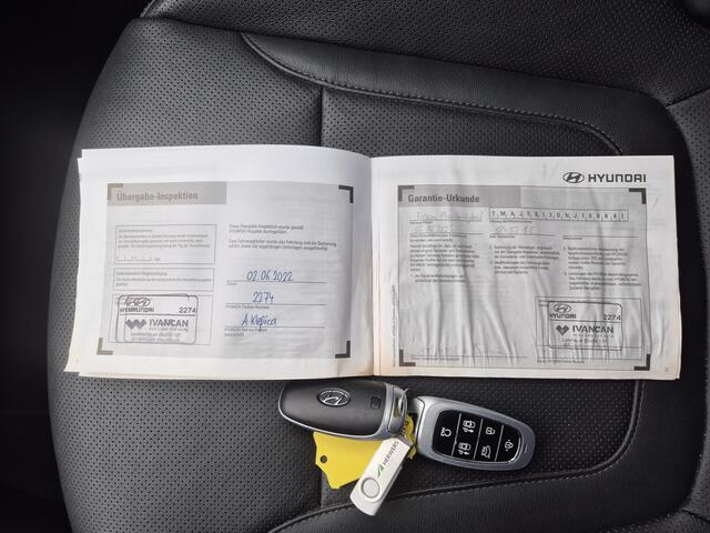 Hyundai TUCSON 1.6 T-GDI PHEV Plug-in Premium Sky 4WD Automaat / Trekgewicht 1350 kg / Glazen schuif- en kanteldak / Apple Carplay Android Auto / Allseason Banden / Stuur-, Stoel en Achterbankverwarming / Elektrische achterklep