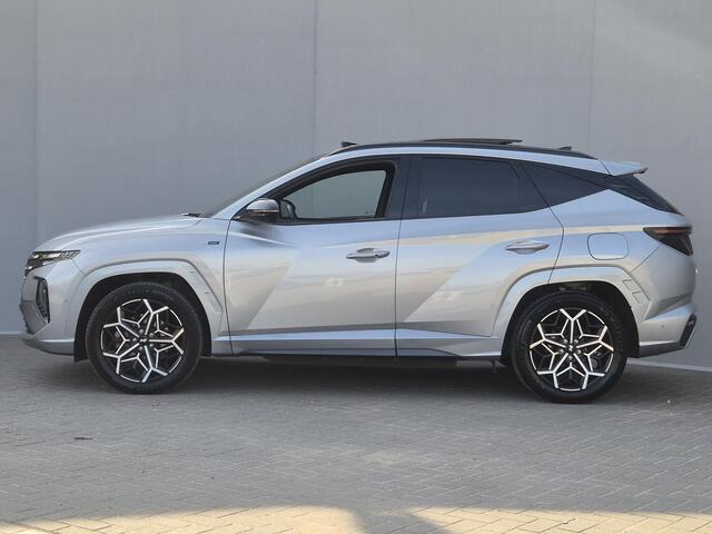 Hyundai TUCSON 1.6 T-GDI PHEV N Line Sky 4WD / Apple Carplay Android Auto / Stuur-, Stoel en Achterbankverwarming / Glazen schuif- en kanteldak / Trekgewicht 1350 kg / Rondomzicht camera / Adaptief CC / Krell Audio Systeem /