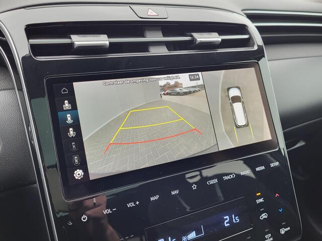 Hyundai TUCSON 1.6 T-GDI PHEV Premium Sky 4WD Automaat / Dealer onderhouden / Afneembare trekhaak (1.350 kg) / Panoramadak / 360° camera / Krell Audio / Stuur,- achterbank,- en voorstoelverwarming / Geventileerde voorstoelen / Android Auto / Apple Carplay