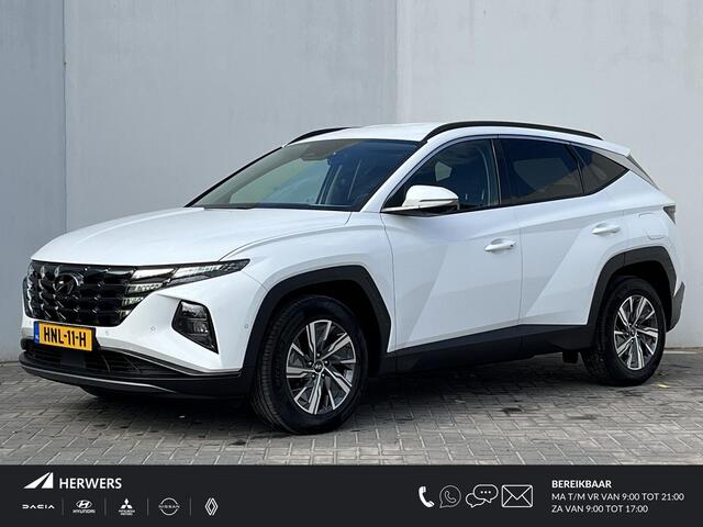 Hyundai TUCSON 1.6 T-GDI HEV 230 PK Premium Automaat / Trekgewicht 1650 kg / Apple Carplay Android Auto / Stuur- en Stoelverwarming / Rondomzicht camera / Climate Control / Stoelventilatie voor /