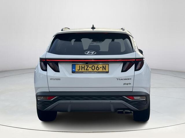 Hyundai TUCSON 1.6 T-GDI PHEV Premium Sky 4WD | Stoelverwarming/verkoeling | Stuurverwarming | Schuif-kantel dak | Lederen bekleding | 2e zit-rij bankverwarming | 360graden camera | 3-zone klimaatcontrole | Elektrische geheugen stoelen | KRELL- premium audiosysteem |