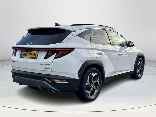 Hyundai TUCSON 1.6 T-GDI PHEV Premium Sky 4WD | Stoelverwarming/verkoeling | Stuurverwarming | Schuif-kantel dak | Lederen bekleding | 2e zit-rij bankverwarming | 360graden camera | 3-zone klimaatcontrole | Elektrische geheugen stoelen | KRELL- premium audiosysteem |