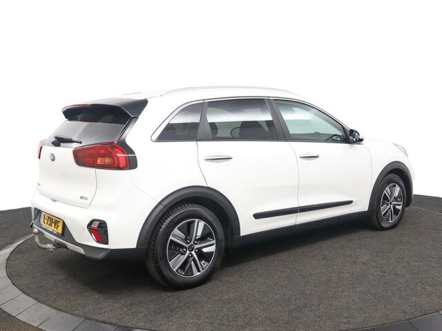 KIA Niro 1.6 GDi Hybrid Dynamicline Edition - Glazen Schuif-/kanteldak - Navigatie - Apple Carplay/Android Auto - Climate Control - Trekhaak - Privacy Glas Achter - Led Verlichting - Parkeersensoren voor en achter - Dealer Onderhouden - Fabrieksgarantie tot 2028