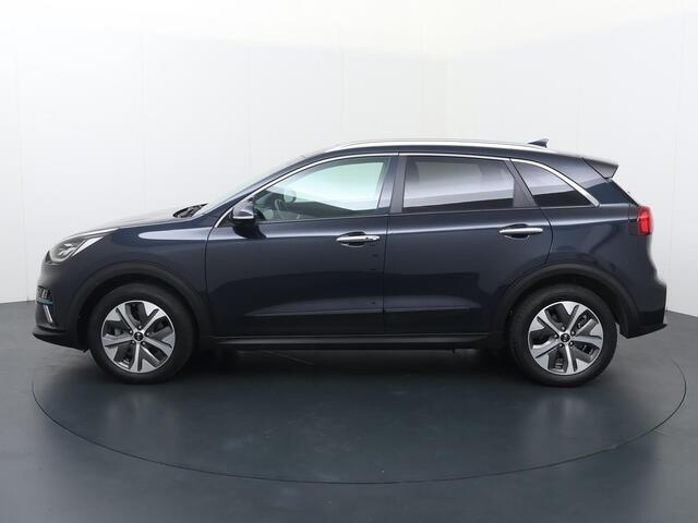 KIA e-Niro DynamicPlusLine 39 kWh | Automaat | Panorama dak | Multifunctioneel stuurwiel | Bluetooth | Spraakbediening | Automatische verlichting | Cruise control | Spiegelverwarming | Dab+ | Navigatie | Apple Carplay - Androidauto | Climate | Stoelverwarming | Stuu