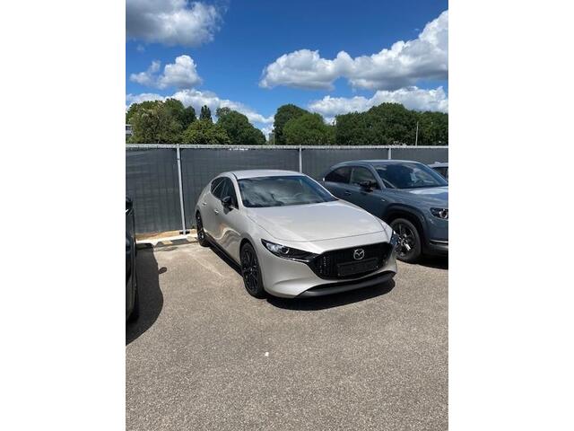 Mazda 3 2.0 e-SkyActiv-X M Hybrid 186 Nagisa Demovoordeel ¤ 5.000,-, Bruin Leder, Bose, Navi, Adap.Cruise, Clima, Apple Carplay, Camera, PDC, HUD, Stoelverwarming, 18" LMV
