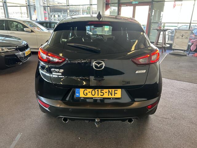 Mazda CX-3 2.0 SkyActiv-G 120 GT-M | Adaptieve cruise control | Lederen bekleding | Trekhaak | Achteruitrijcamera | Lane assist | Dodehoeksdetectie | Stoelverwarming | Climate control | Navigatie | Head up display