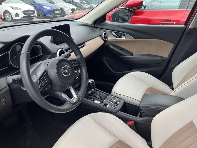 Mazda CX-3 2.0 SkyActiv-G 121 Luxury , Automaar, Trekhaak, Camera, Navi, Apple Carplay, Android Auto, Stoelverwarming, Cruise, LKA, PDC, LMV 18 Inch, Wit Leder