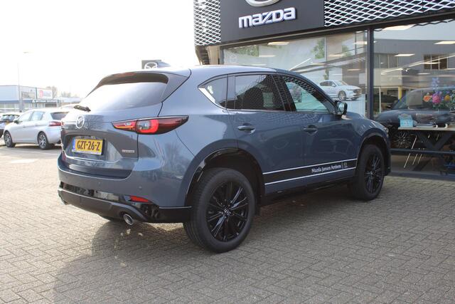 Mazda CX-5 2.0 e-SkyActiv-G M Hybrid 165 Homura , Demovoordeel ¤ 6.390-, Navi, Adap.Cruise, Clima, Leder, Apple Carplay, 360 Camera, PDC, HUD, Stoelverwarming/ventilatie, 19" LMV, Elek.Achterklep