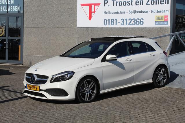 Mercedes-Benz A-KLASSE 180 Business Solution AMG AUTOMAAT/Panoramadak/Navigatie/Achteruitrijcamera/Climate control/Cruise control/Bluetooth/Trekhaak/Sport interieur/18'' Lichtmetalen velgen/LED koplampen.