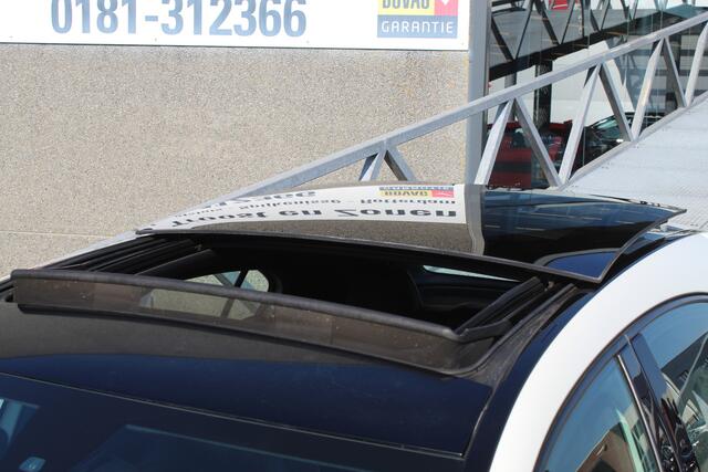 Mercedes-Benz A-KLASSE 180 Business Solution AMG AUTOMAAT/Panoramadak/Navigatie/Achteruitrijcamera/Climate control/Cruise control/Bluetooth/Trekhaak/Sport interieur/18'' Lichtmetalen velgen/LED koplampen.