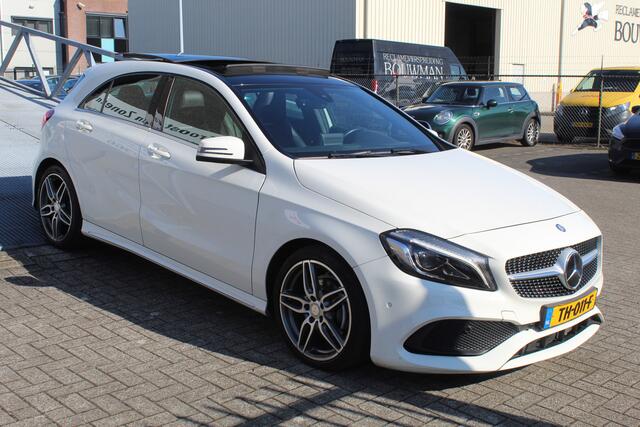 Mercedes-Benz A-KLASSE 180 Business Solution AMG AUTOMAAT/Panoramadak/Navigatie/Achteruitrijcamera/Climate control/Cruise control/Bluetooth/Trekhaak/Sport interieur/18'' Lichtmetalen velgen/LED koplampen.