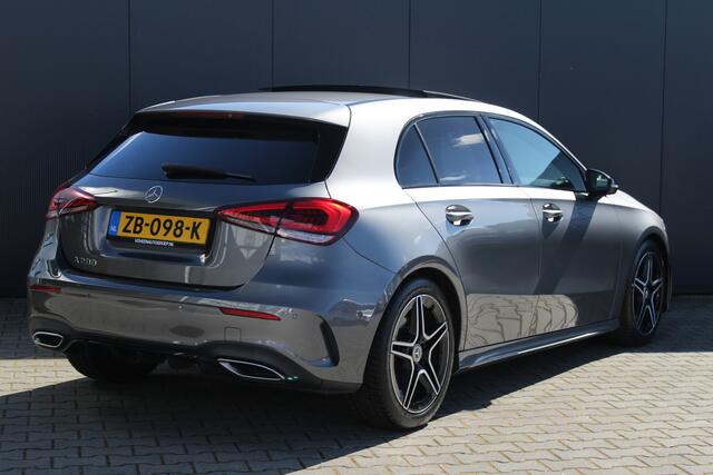 Mercedes-Benz A-KLASSE 200 Business Solution AMG Night Upgrade 164pk | incl. 12 maanden garantie | Night pakket | Panoramadak | AMG pakket | Virtual cockpit | Stoelverwarming | F1 Flippers | Lane assist | Zwarte hemel | Navigatie | 18" lichtmetalen velgen | Parkeersensoren | LE