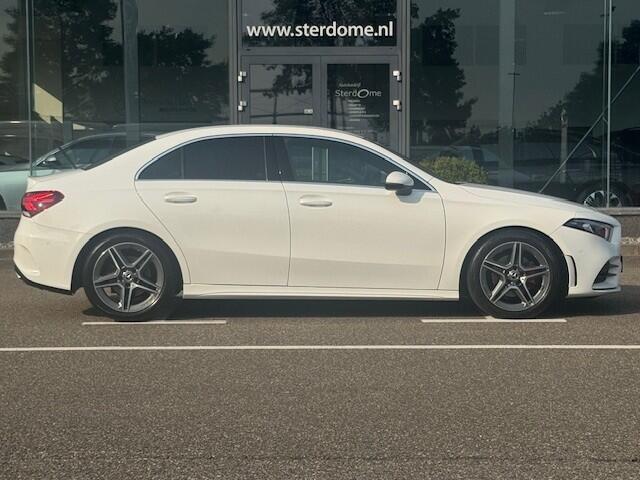 Mercedes-Benz A-KLASSE 200 Business Solution AMG l MBUX l LED High Performance l Camera l Smartphone integratie pakket l Licht en Zicht pakket l Airco l Deelbare Achterbank l PTS l Airconditioning l Spiegel pakket l