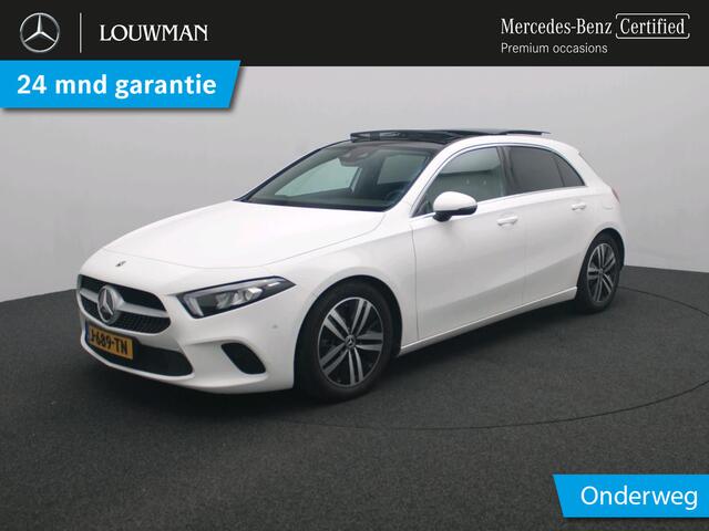 Mercedes-Benz A-KLASSE 160 Business Solution Luxury Panorama Schuif-Kanteldak | Sfeerverlichting | Achteruitrijcamera | Stoelverwarming voor | Buitenspiegels elektrisch inklapbaar. Inclusief 24 maanden MB Certified garantie voor Europa.