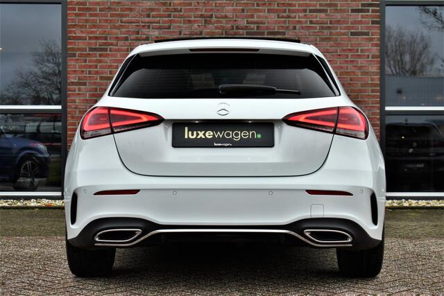 Mercedes-Benz A-KLASSE 180 AMG Pano Trekhaak Camera Night Metallic-wit