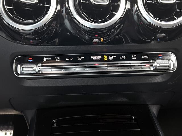 Mercedes-Benz B-KLASSE 180 Business Solution AMG | Trekhaak | Parkeerpakket met Camera | Car Play | Stoelverwarming | LED | Cruise Controle | Inclusief 24 maanden Mercedes-Benz Certified garantie voor Europa.