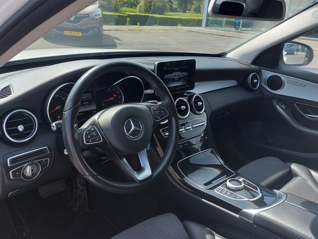 Mercedes-Benz C-KLASSE 180 156pk Automaat Business Solution Plus | Origineel NL | Navi | Clima | Cruise | Led Koplampen | Pdc V+A+Assist+Camera | Dodehoek+Licht+Regensensor | Privacy Glass | 18''lm