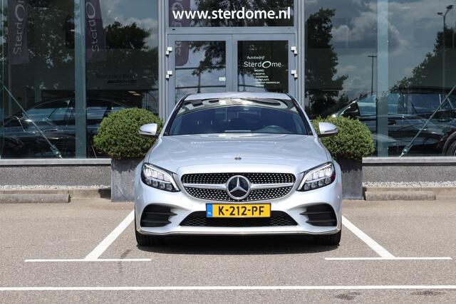 Mercedes-Benz C-KLASSE 180 Business Solution AMG I Camera I Tempomaat I Stoelverwarming I Virtual dashbord I Led I Automaat I I Essenhout I Parkeersensoren I Nederlandse auto I